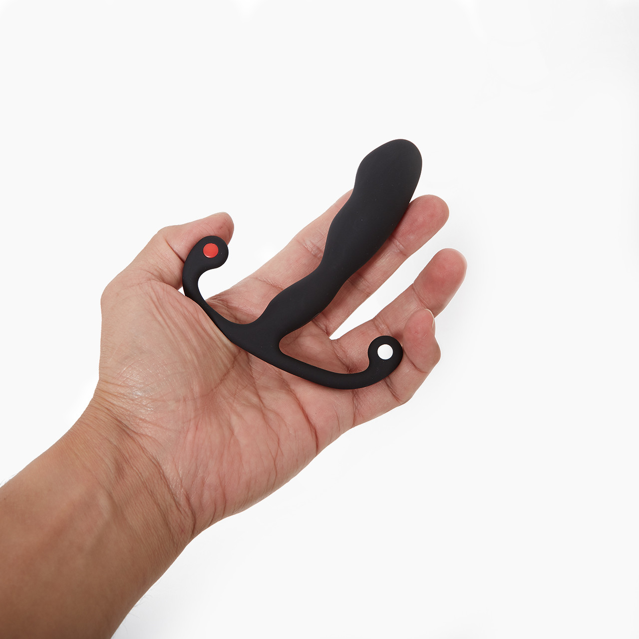 Aneros Helix Syn Trident', a black silicone prostate massager held in a hand