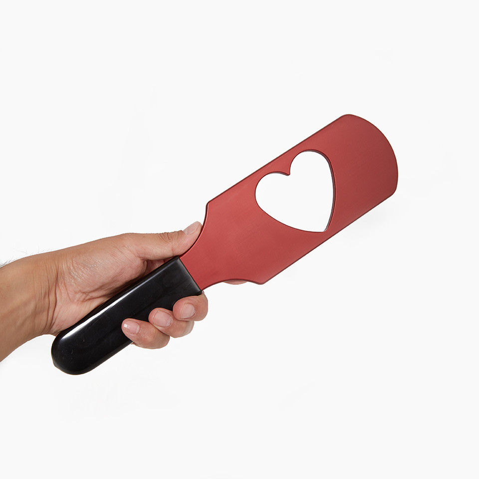 Red Heart Aluminum Paddle held in hand