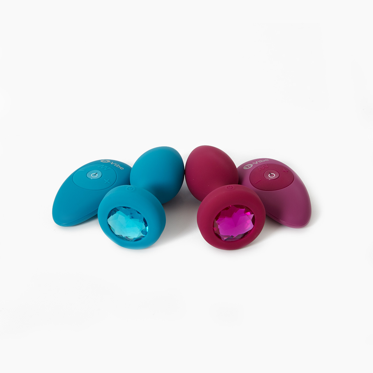 b-Vibe Vibrating Jewel Plugs in Blue and Pink