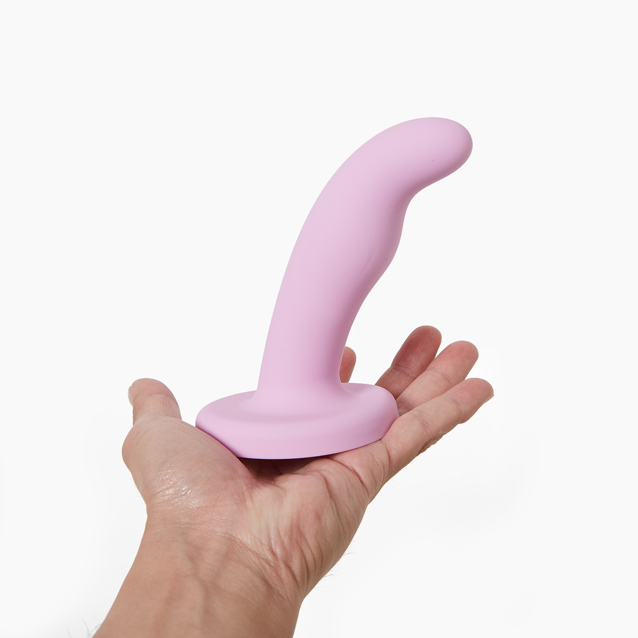 A hand displaying 'Sportsheets Lazre', a curved silicone toy with a base