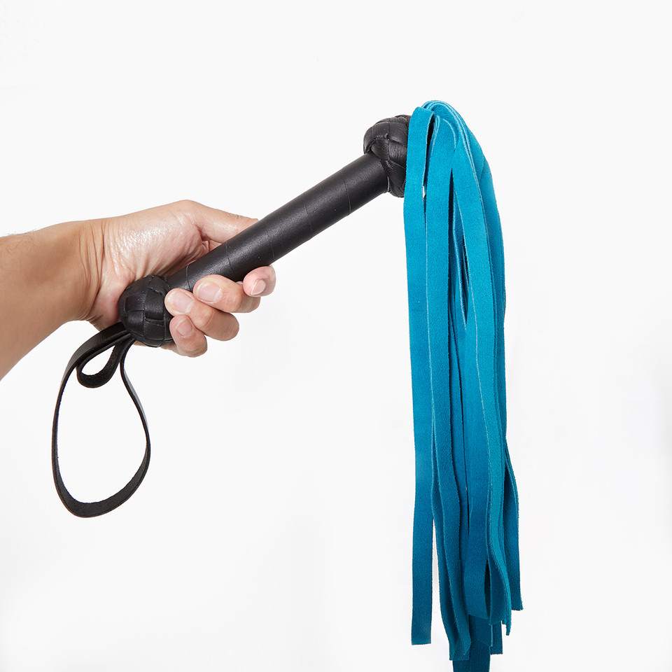 Lite Line Suede Flogger held in hand