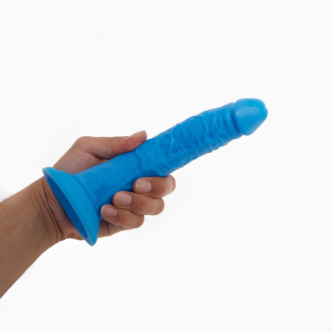 Neo Elite 7.5" Realistic strap- on Penis Dildo held in hand